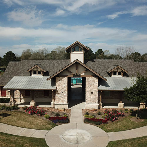 Residential Asphalt Shingle Roof with Metal Porch Cover