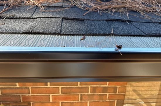 Seamless Gutter Replacement Huffman TX Seamless gutter replacement installed on a residential home exterior in Huffman, TX by STX Roofing