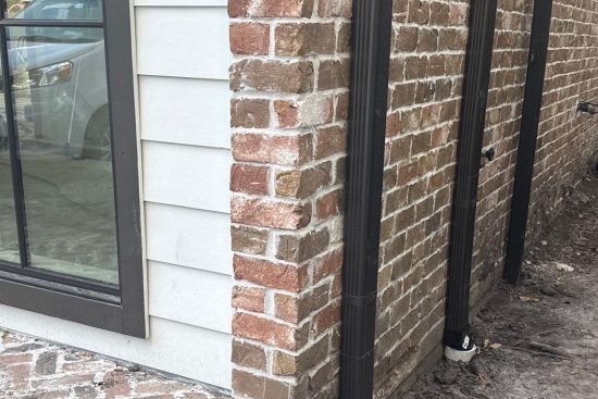 Seamless Gutter Replacement Huffman TX Seamless gutter replacement installation on a residential home in Huffman, TX by STX Roofing