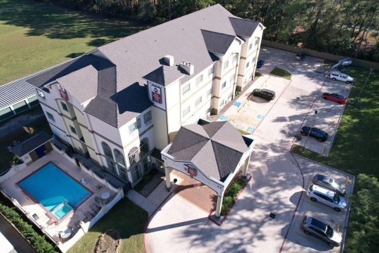 Houston Hotel Roof Replacement – STX Roofing Hotel shingle roof replacement in Houston TX by commercial roofing contractor STX Roofing
